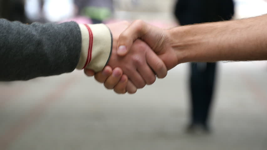 Male hands giving the keys to car to his friend. Handshake between two men outdoor. | Shutterstock HD Video #17040061
