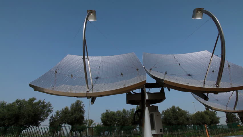 Shot of two solar panels as they tilt down at the Zenith Solar Plant at Kibbutz
