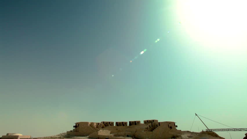 the Beresheet Hotel under construction on the edge of the Mitzpe Ramon Crater in Israel. The building is being built to blend with the natural desert surroundings of Israel.