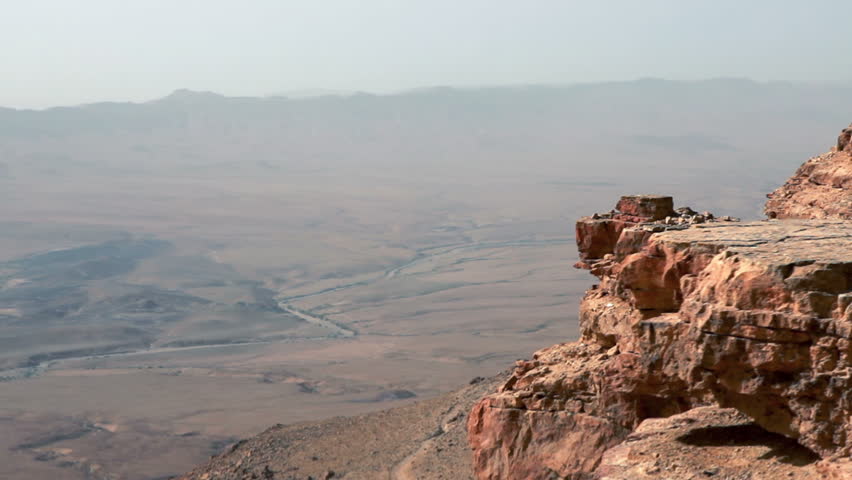 Wide slider move from out over the ledge looking at the scope of the Mitzpe
