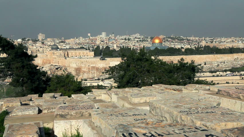Slider dolly across the  graves at the Jewish cemetery of Jerusalem, Israel with