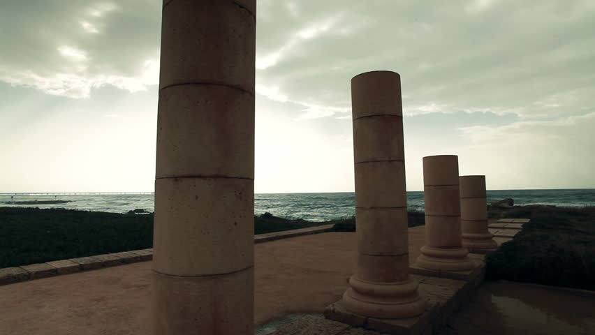 Wide shot of four columns of diminishing size from the palace ruins at Caesarea