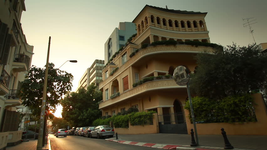 Tel Aviv, Israel street, shot at twilight with the shutter set at 22 fps, hence,