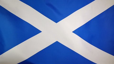 Slowmotion of a real textile flag of Scotland with wind blowing through the fabric seamless close up