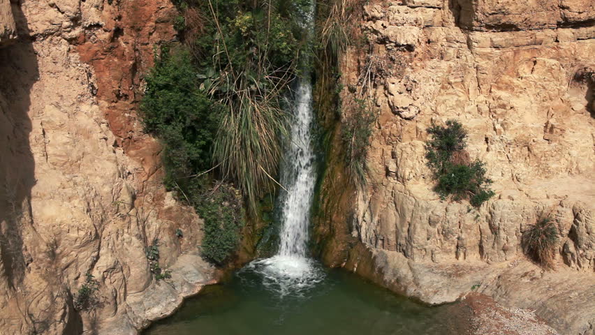 Wide angled shot of a waterfall from the Ein Gedi Nature Reserve in Israel