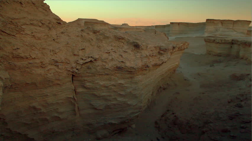 Dolly slider move left to right of beautiful rock formations in the desert of