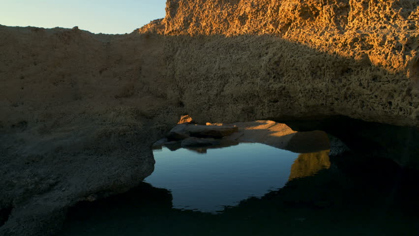 Dor Beach static shot of a rock arch over an Israeli Mediterranean pool at