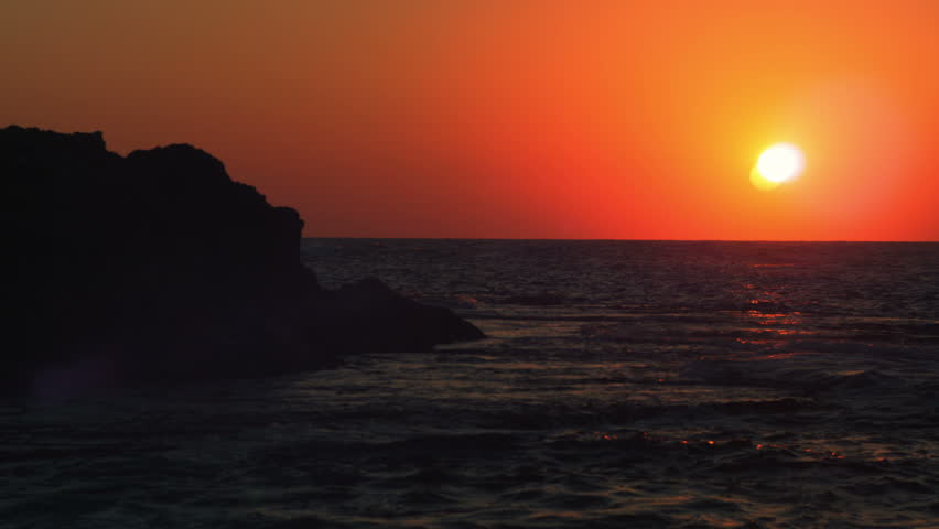 The setting sun over the Mediterranean at Dor Beach Israel.  