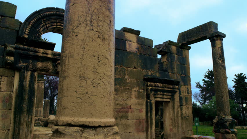 Shot of front portion of the facade and column of the Bar'am ruin in Israel. 