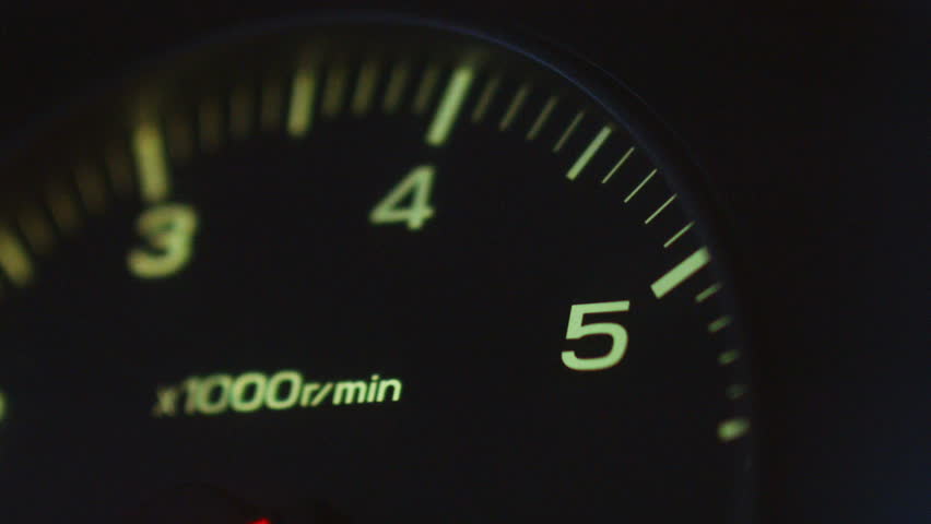 The car pics up speed, the load on the engine,  tachometer Royalty-Free Stock Footage #17079472