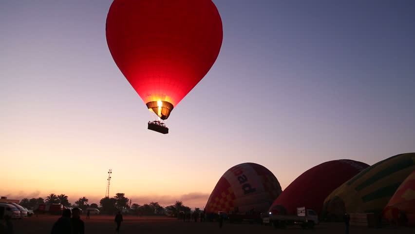 Hot air ballooning in Luxor over the Valley of the Kings and Nile river.
