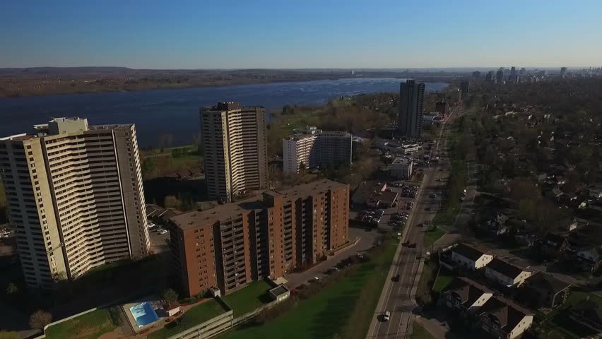 aerial establishing view of city buildings and sky scrappers and cars with beautiful landscape in downtown ottawa