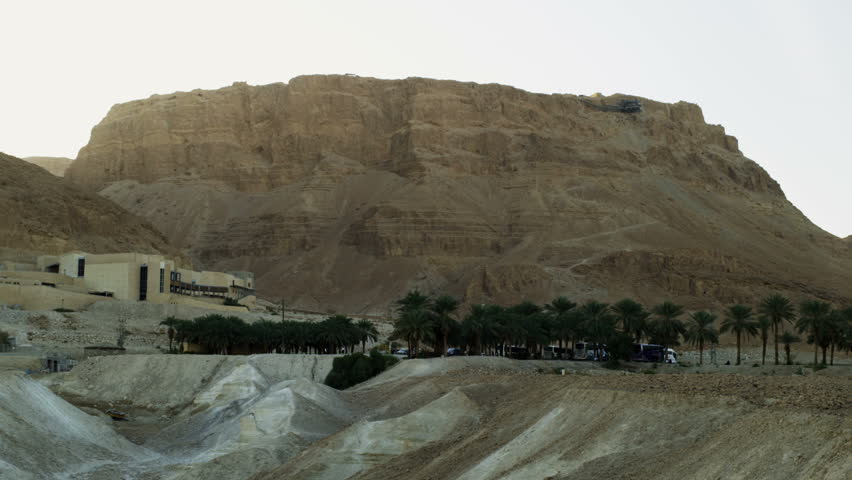 Mount Masada, Israel.  the Masada school, and tourst parking lot is in the