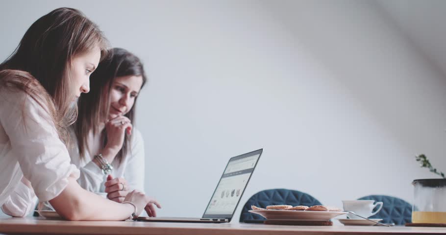 Two Women Working On Laptop, Stock Footage Video (100 ...