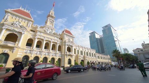 Ho Chi Minh City, Vietnam - May 21, 2016: Traffic in front of the City Hall in Ho Chi Minh City (Saigon), Vietnam. 