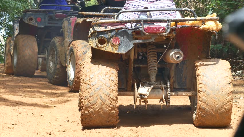 ATV Rider Takes on the Trail