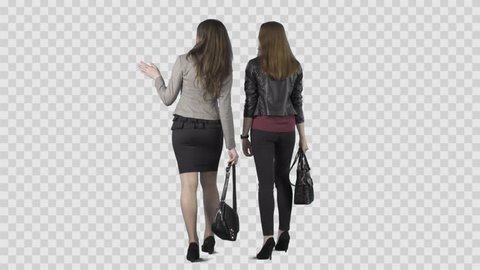 Two beautiful girls are walking away from the camera and watching something. Footage with alpha channel. Lens 85 mm. Camera is static. File format - .mov, codec PNG+Alpha