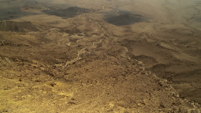 Panoramic of the desert floor of the  Mitzpe Ramon Crater, in Israel.  