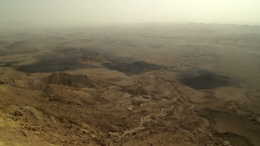 Panoramic of the desert floor of the  Mitzpe Ramon Crater, in Israel. Move is