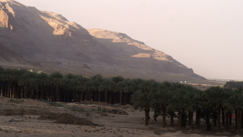 Long pan left to right of the barren mountains of the Ein Gedi Israel, to a