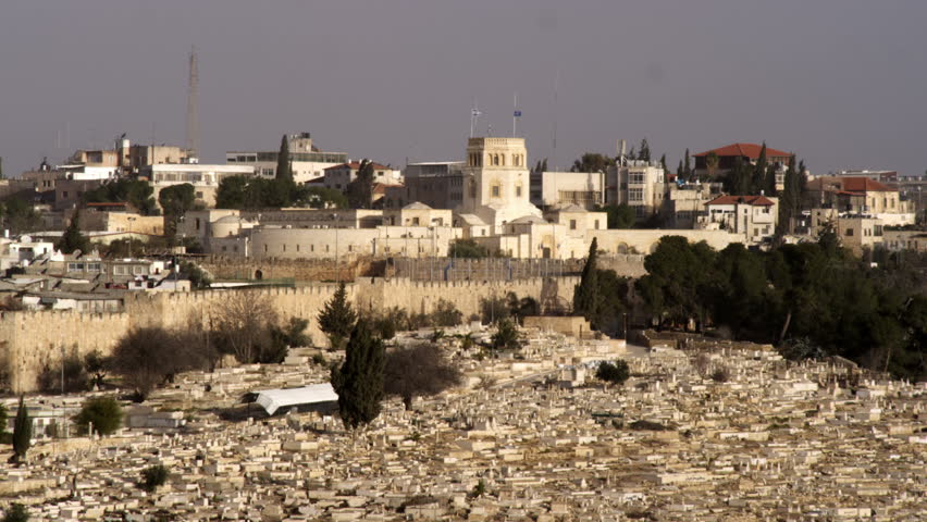 Jerusalem, Israel cemetery in the foreground with the old city wall running