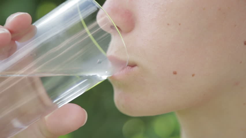 The girl drinks water | Shutterstock HD Video #17115700