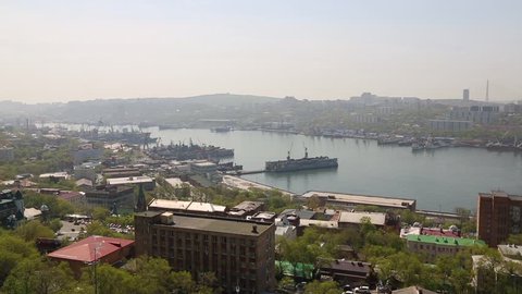 View on Vladivostok from the lookout on a hill Eagle's Nest, Russia. Beautiful views of the city, the Golden Horn Bay and the bridge Golden Bridge.