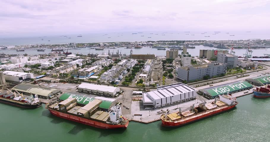 Aerial view of container ship anchored in the Port of Kaohsiung  loaded with containers, Kaohsiung city - Taiwan 