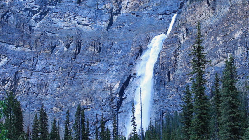 Takakkaw Falls in Yoho National Park, British Columbia, Canada. Second highest waterfall in Canada at 1260 feet. Beautiful late afternoon capture against the sheer mountain rocks. 