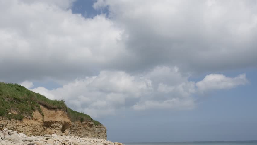 Sword beach D-Day allies landing area in northern France Normandy 4K 2160p 30 fps UltraHD tilting footage - Operation Overlord WW2 Sword beach by the day slow tilt 4K 3840X2160 UHD video