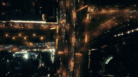 Cityscape with  transport trafficat autumn evening. Aerial view