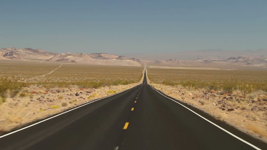 Driving shot on an empty road in Death Valley National Park | Shutterstock HD Video #1715788