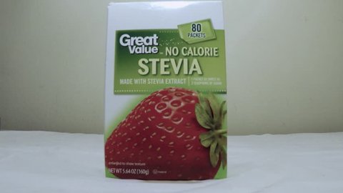 WHITTIER, CALIFORNIA/USA: February 10, 2016- Camera slowly tilts and zooms toward a box of Stevia Healthy Natural Sweetener. Stevia is known as an alternative to sugar and it's unhealthy side effects.