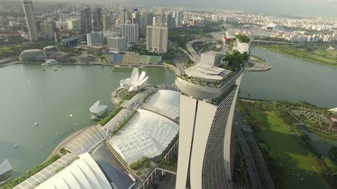 SINGAPORE, MAY 2016: Travelling aerial shot of Marina Bay Sands with Singapore City Skyline as background - May 2016 (Singapore)