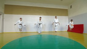 Martial arts instructor training  students in gym