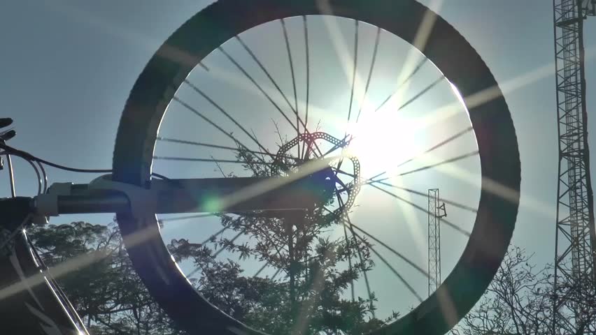 MTB - Bike tire spinning in the sun 