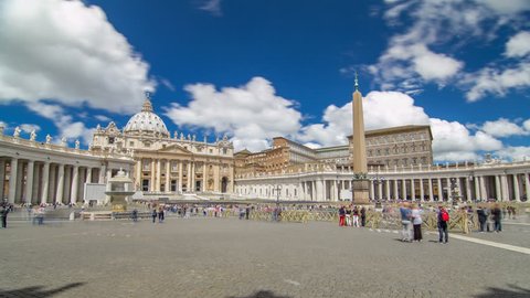 St.Peter's Square full of tourists with St.Peter's Basilica and the Egyptian obelisk within the Vatican City timelapse hyperlapse