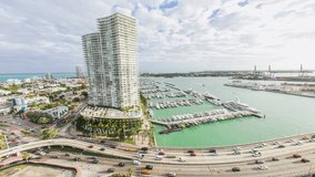 Miami Beach Balcony 4K Time Lapse Overlooking Highway and Boat Dock