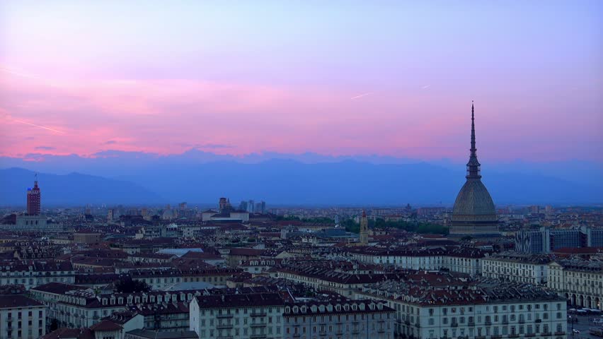 panoramic view of turin skyline at sunset alps in the background