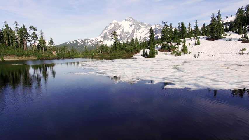 Aerial Glacial Snow in Picture Lake at Mt Baker, Mt Shuksan Background
