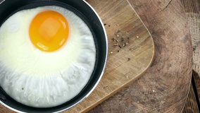 Seamless loopable fried Eggs footage (4K)
