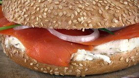 Portion of rotating Bagels with Salmon as not loopable 4K UHD footage