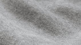 Grey training shirt or pants fine fabric texture close-up 4K 2160p 30fps UltraHD tilting footage - Cotton and polyester sweater pattern of cloth slow tilt 4K 3840X2160 UHD video