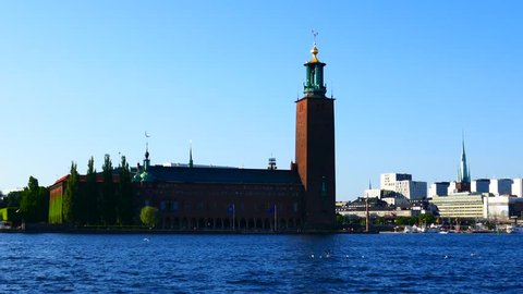 STOCKHOLM, SWEDEN, JUNE 2016: A tracking shot view of Stockholm city hall center and old town from inside the water