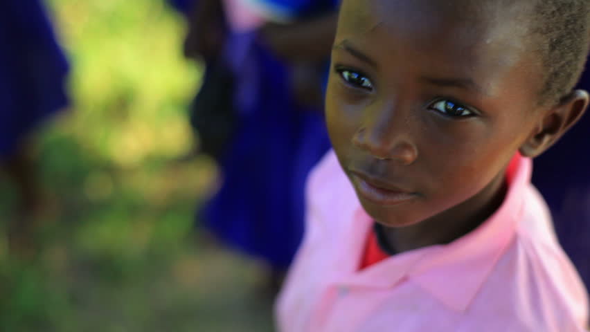 KENYA, AFRICA - CIRCA 2011: Little girl looking at the camera. 