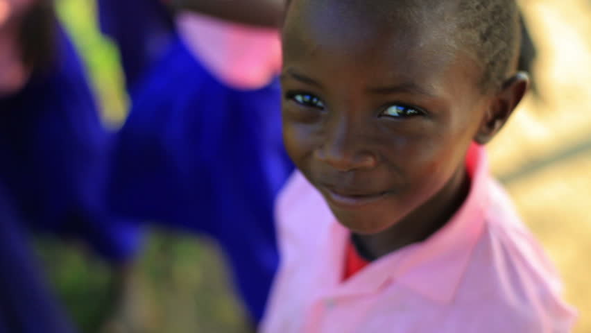 KENYA, AFRICA - CIRCA 2011: Little girl looking at the camera.