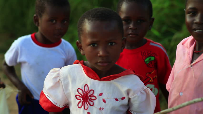 KENYA, AFRICA - CIRCA 2011: Children looking at the camera and smiling.