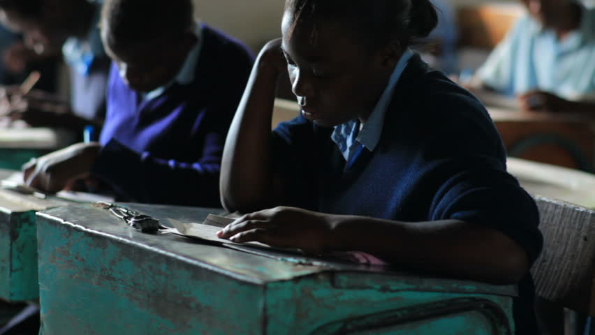 KENYA, AFRICA - CIRCA 2011:  Students doing classwork in Kenya, Africa.