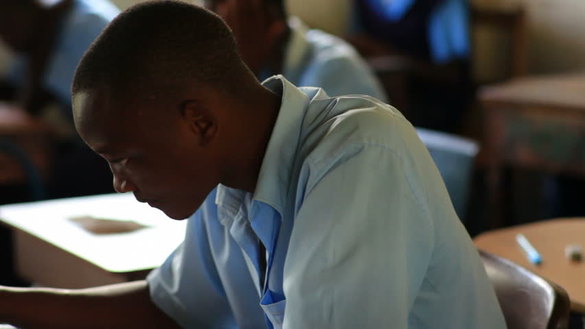 KENYA, AFRICA - CIRCA 2011: Front view of school boy in class in Kenya, Africa.