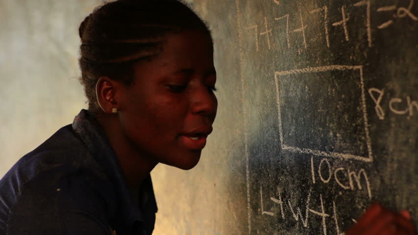 KENYA, AFRICA - CIRCA 2011: Close up of teacher in Kenya, Africa. Front view.